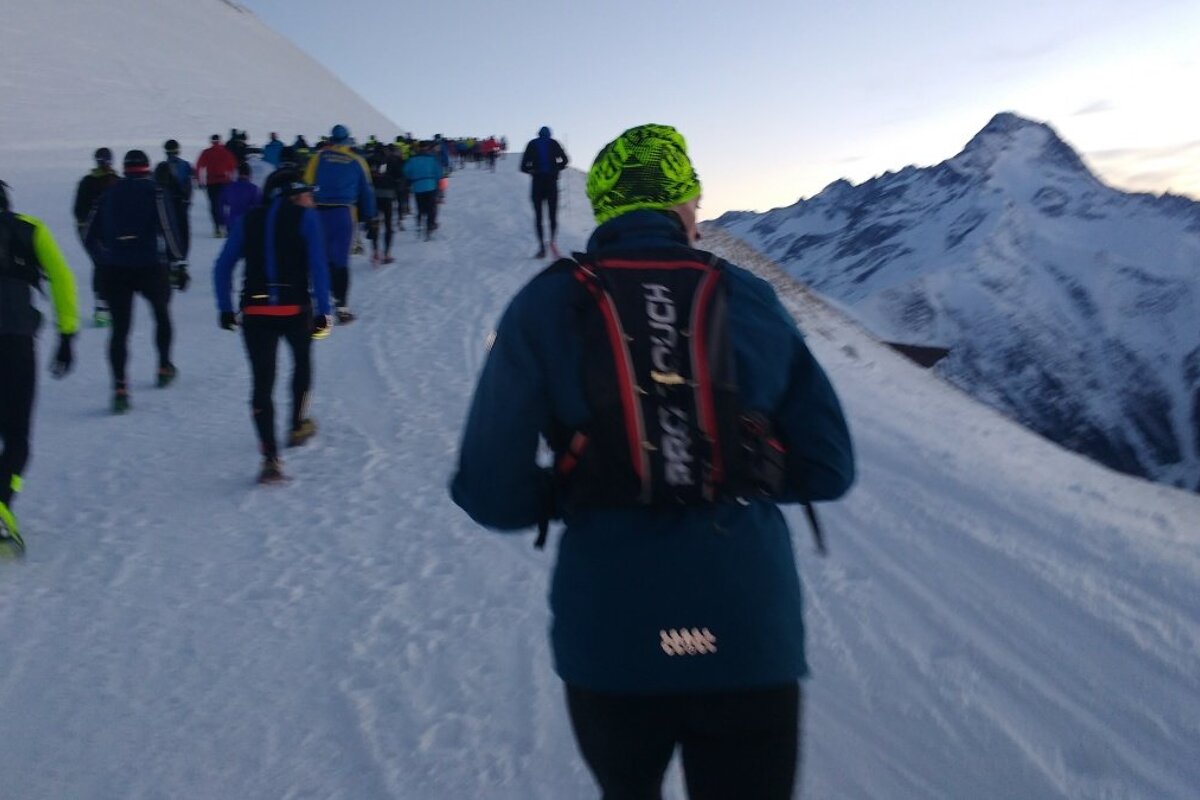 running up a piste at night