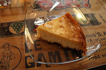 a slice of cake on a glass plate