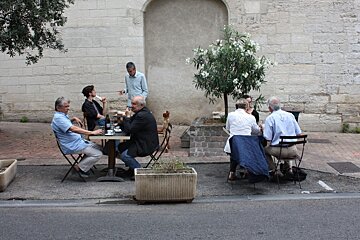 a terrace outside a restaurant in provence
