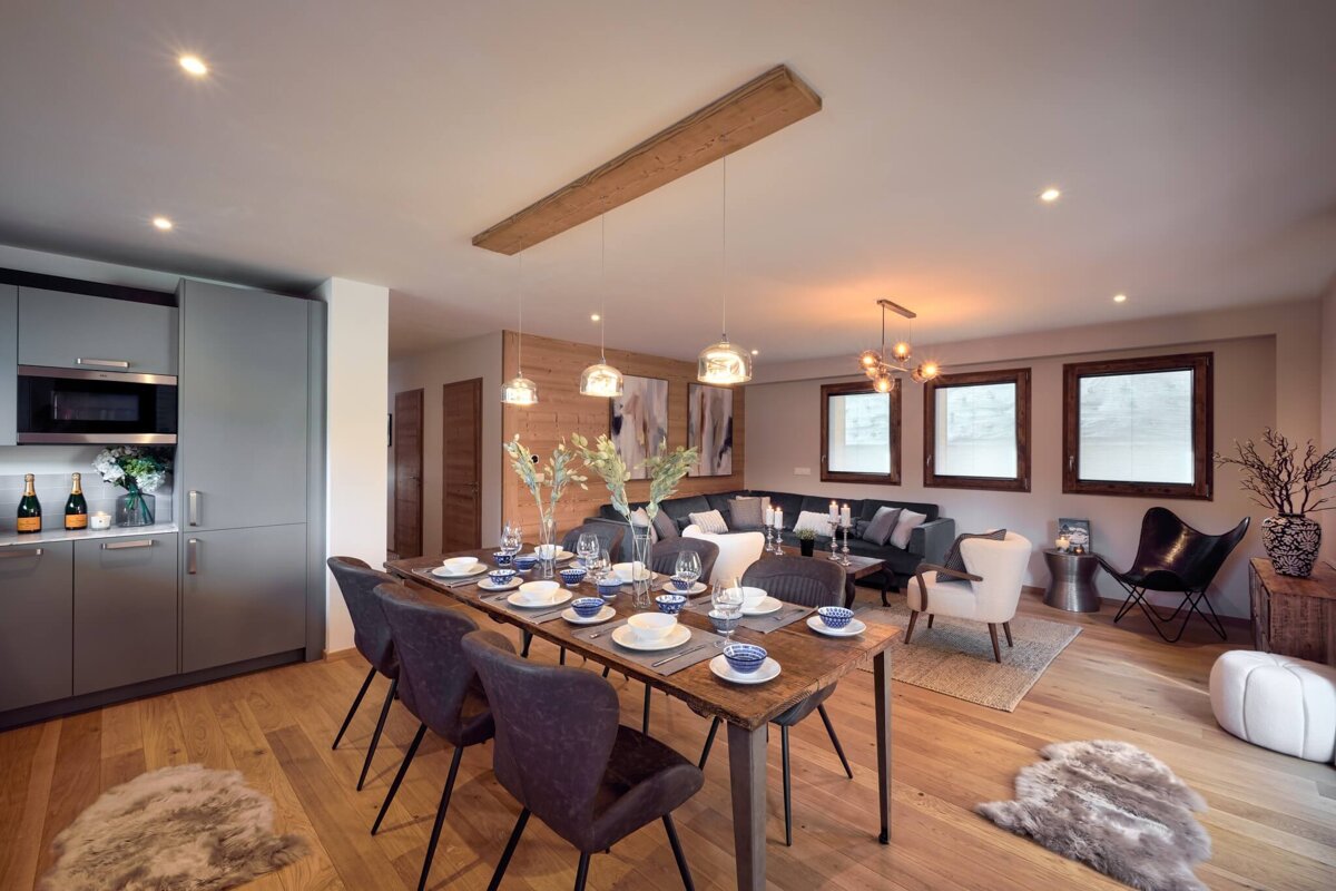 A kitchen with a bottle of champagne on the counter