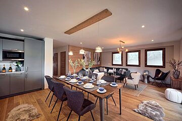 A kitchen with a bottle of champagne on the counter