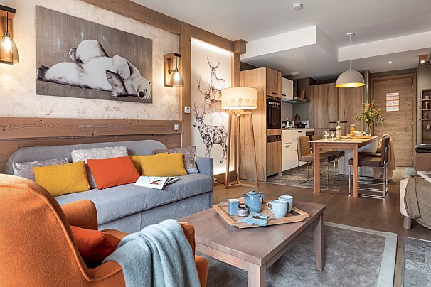 A living room with a couch and a coffee table