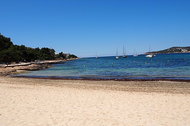 a deserted beach in ibiza