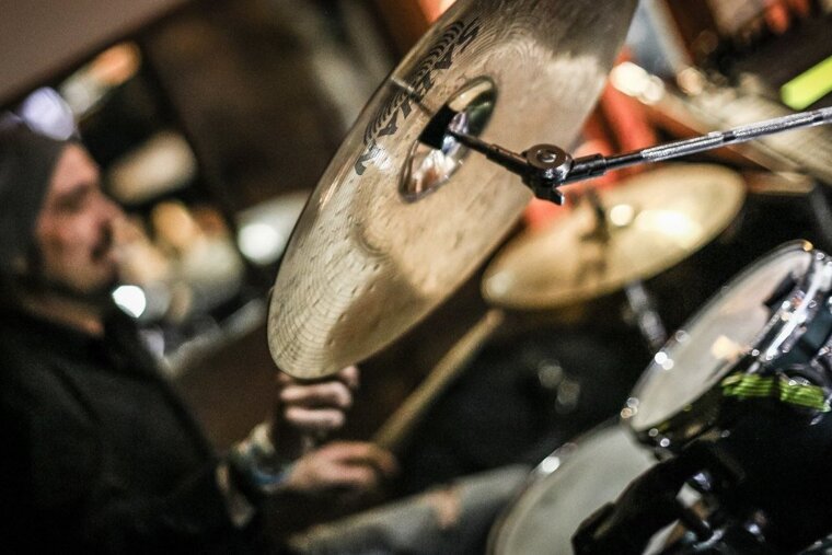 a man playing drums