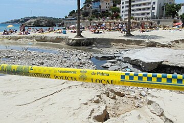 police tape around the beach