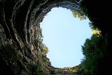 Looking up to the sky from the bottom of the chasm