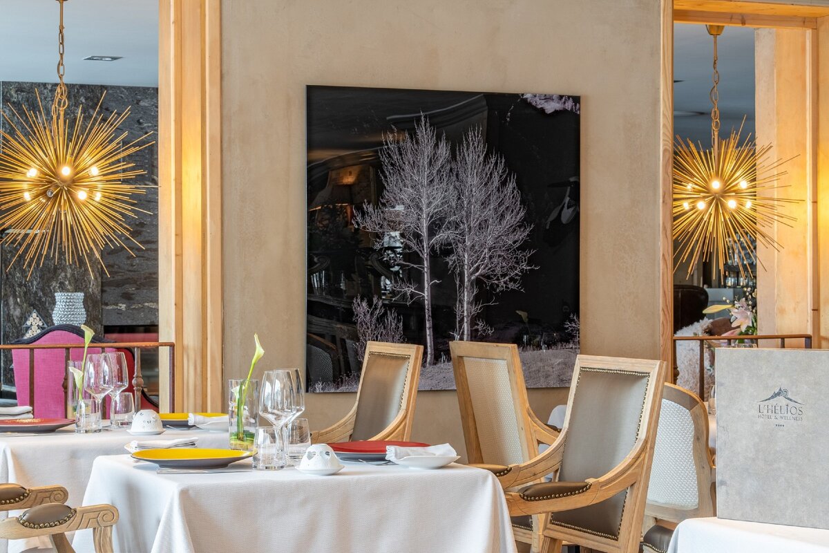 A restaurant with a menu that says l' ermitage on it