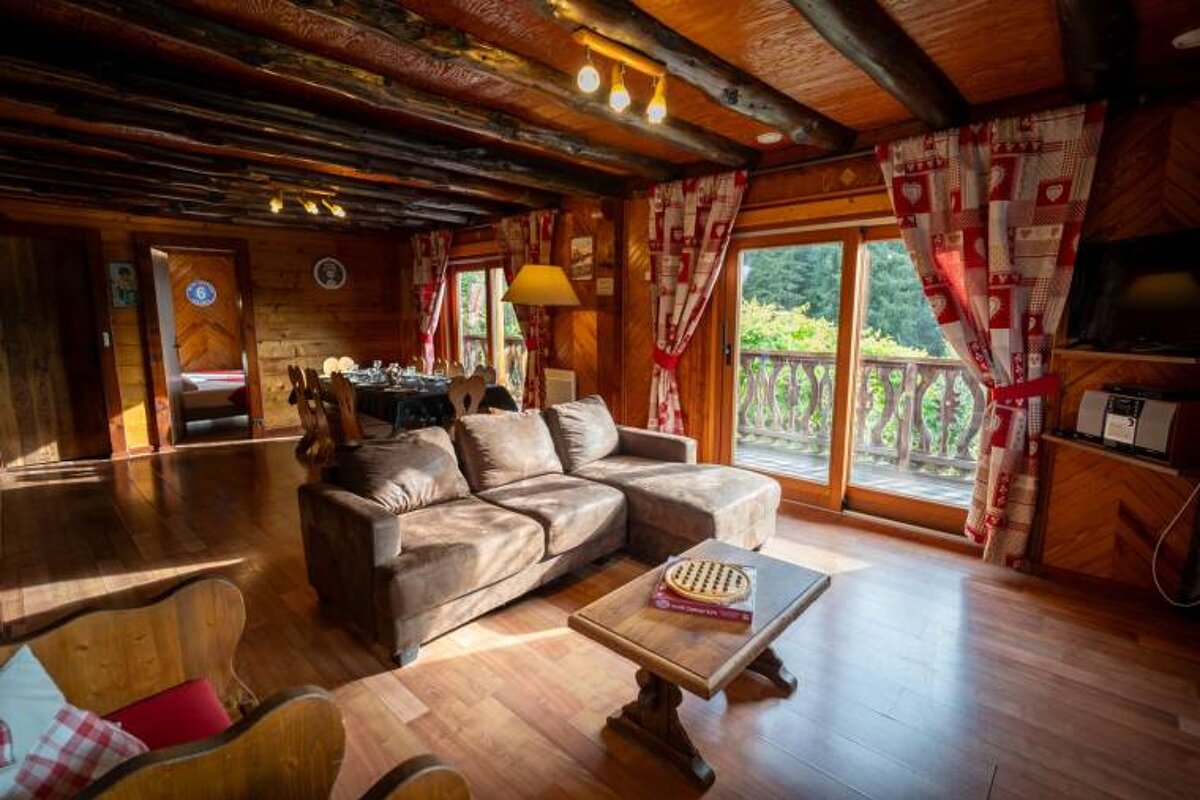 A living room with a couch and a coffee table
