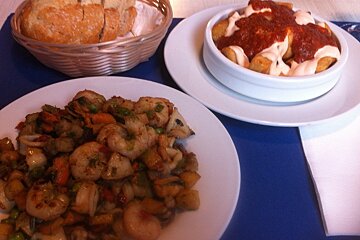 three plates of food in a spanish restaurant