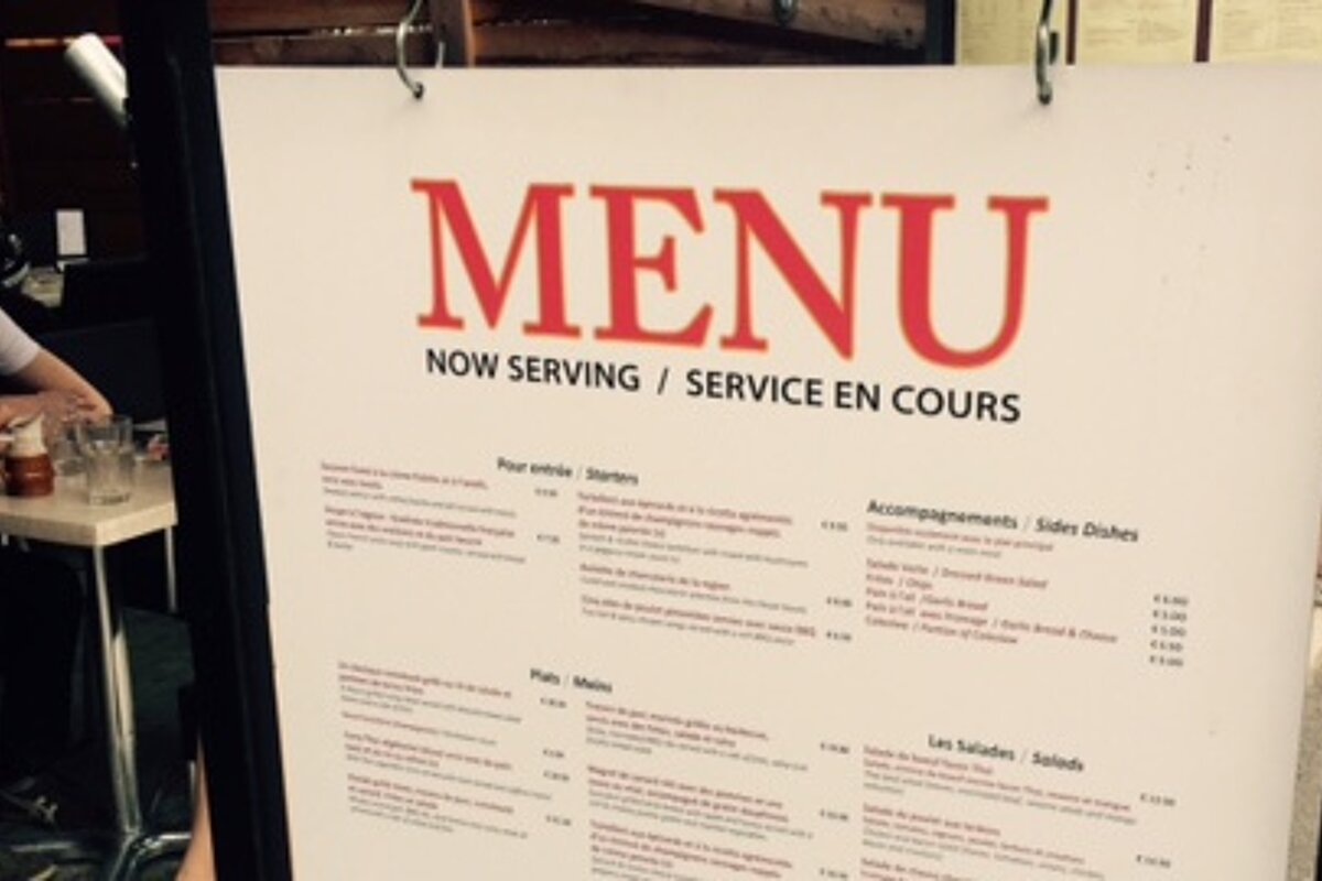 a menu at a restaurant in morzine