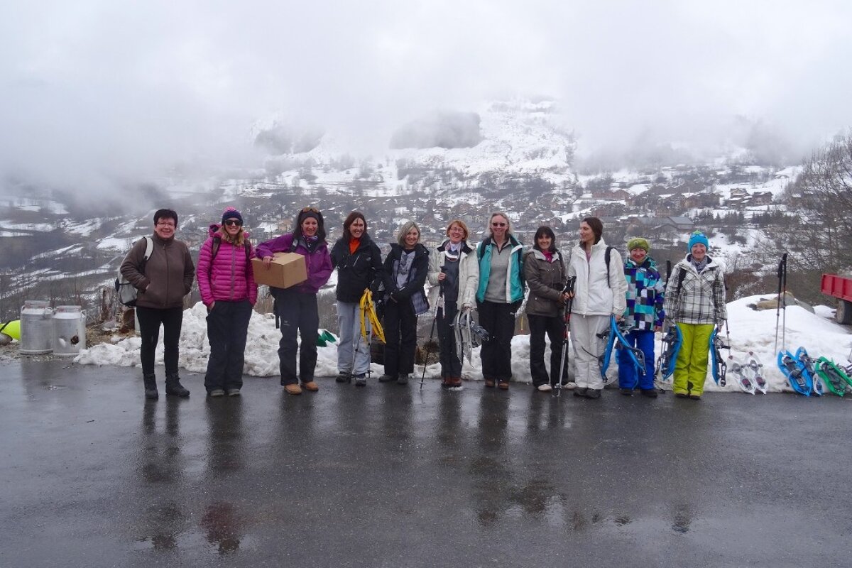 a group of people meeting to go snow shoeing
