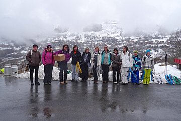 a group of people meeting to go snow shoeing