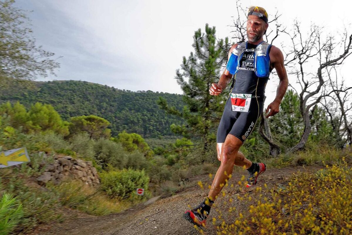 A trail runner in the mountains of Sospel