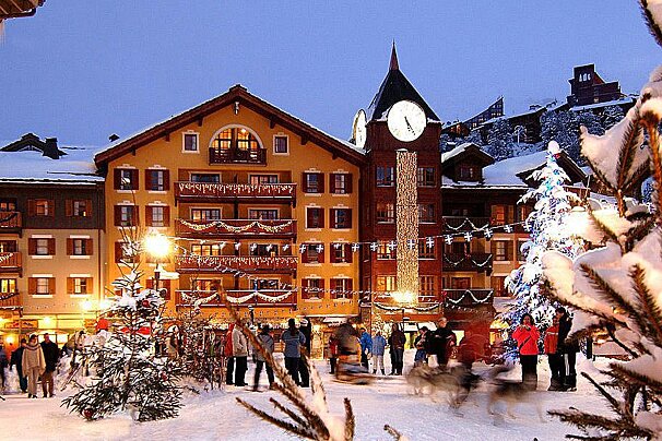 Arc 1950 village at dusk with Christmas lights