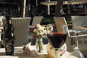 a glass of red wine at a restaurant in mallorca