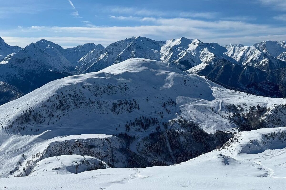 a very snowy Alpe d'Huez in the sunshine
