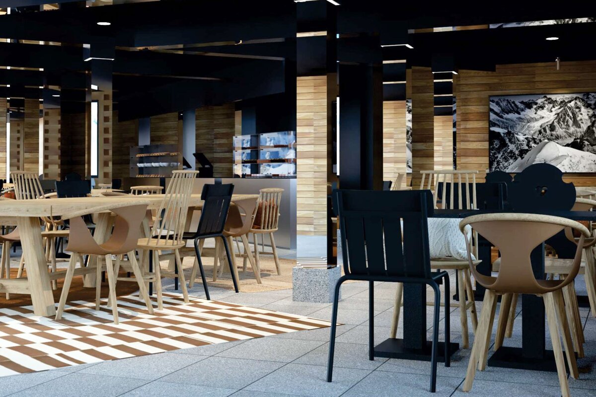 A restaurant with tables and chairs and a picture of a mountain on the wall