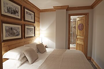 A bedroom with the number 3 on the door