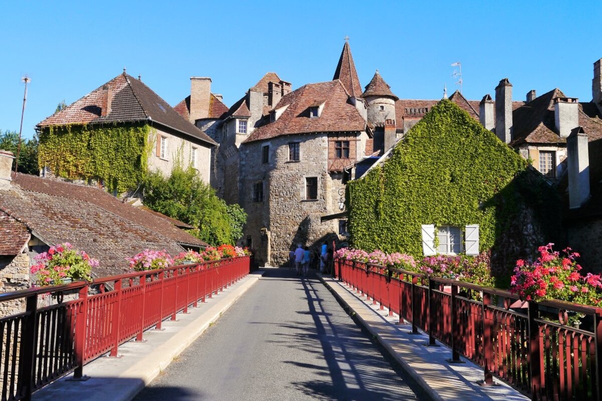 looking across a bridge into the town of Carennac