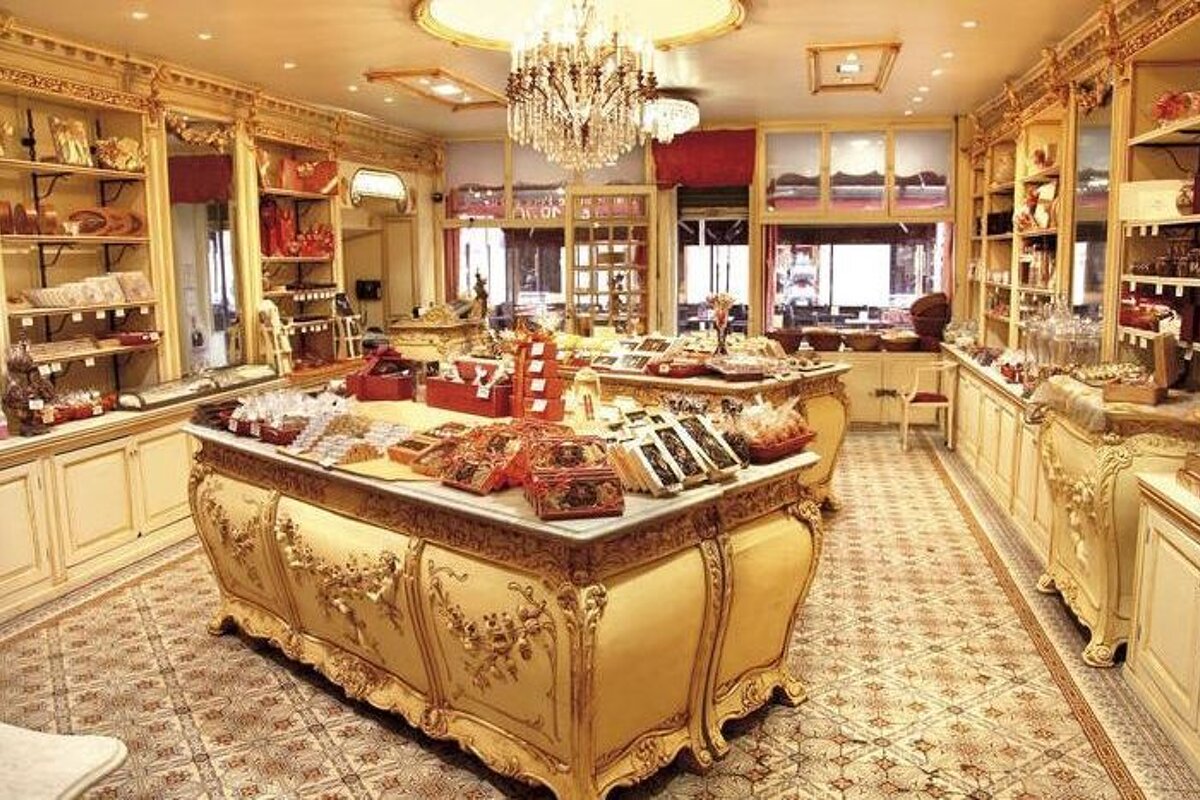 A store filled with lots of candy and a chandelier