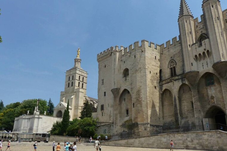 a large medieval building in Avignon Provence