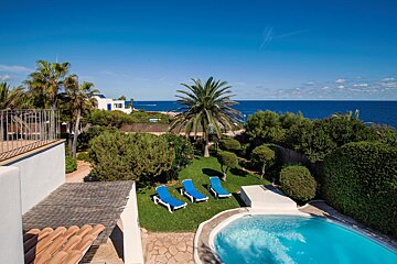 A swimming pool with a view of the ocean