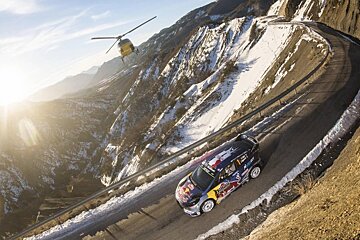 a rally car on icy roads in the southern alps