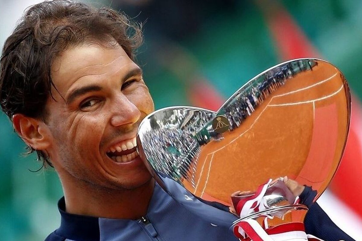 rafa Nadal and his trophy