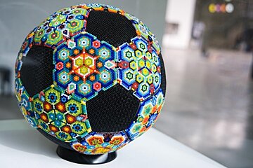 a beaded football by artist Javier Rodriguez