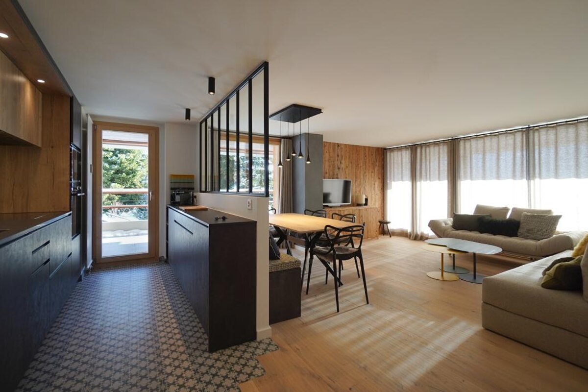 A living room with a couch and a table