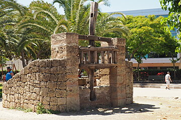 a stone well with wooden parts in mallorca