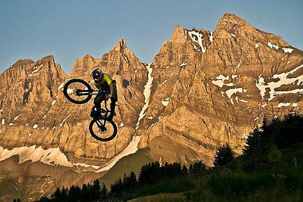 a mountain biker jumping in the air