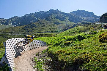 a mountain biker on a wall ride