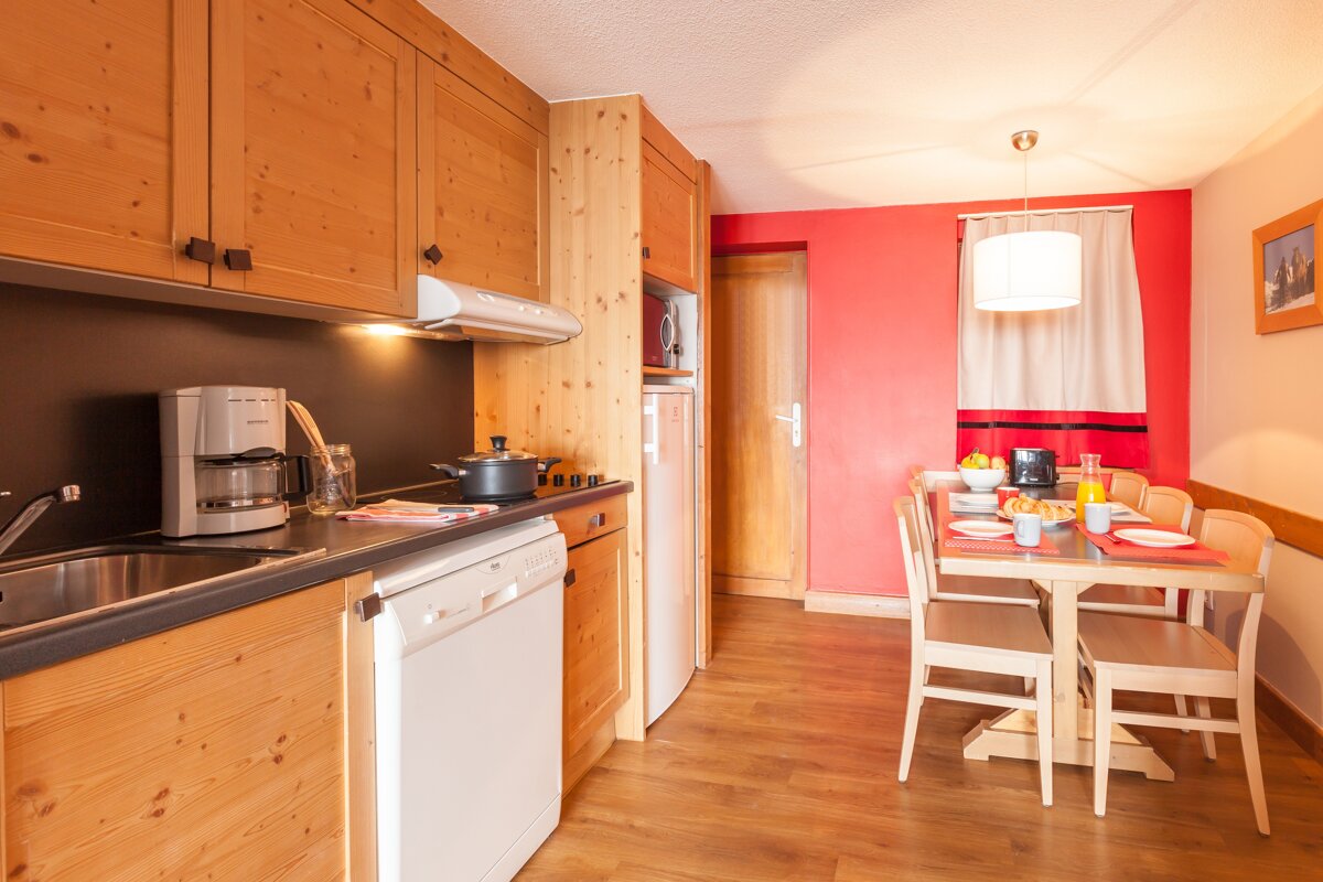 A kitchen with a siemens coffee maker on the counter