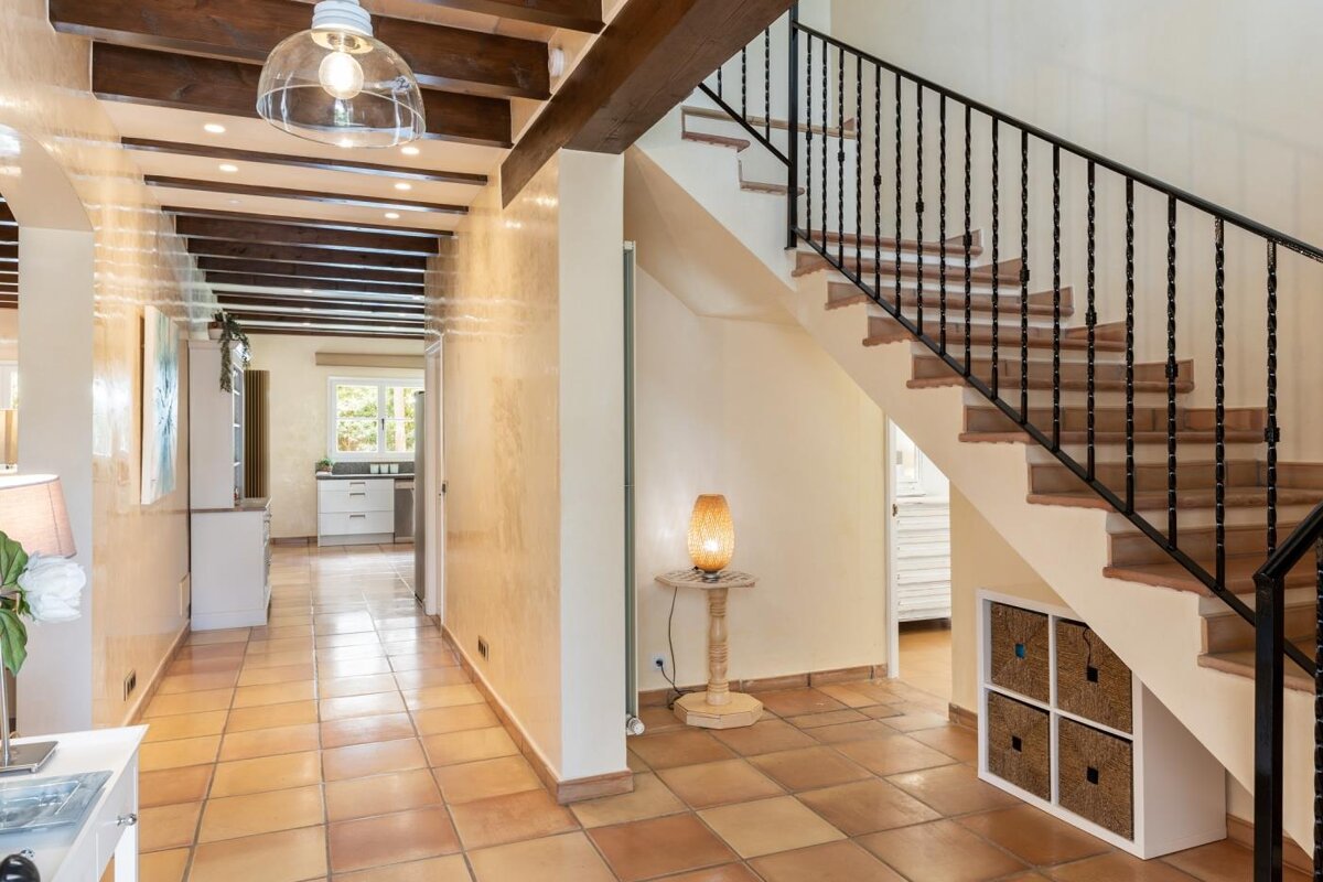 A staircase leading up to the second floor of a house