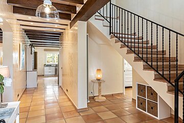 A staircase leading up to the second floor of a house