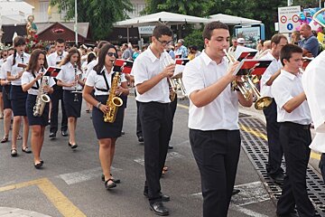 a band playing on the street in pollenca