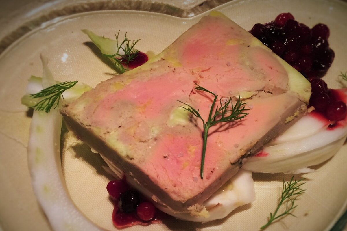 A heart shaped plate with a piece of food on it