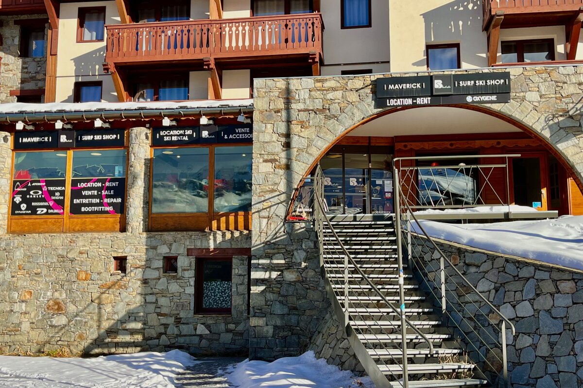 A building with a sign that says maverick on it