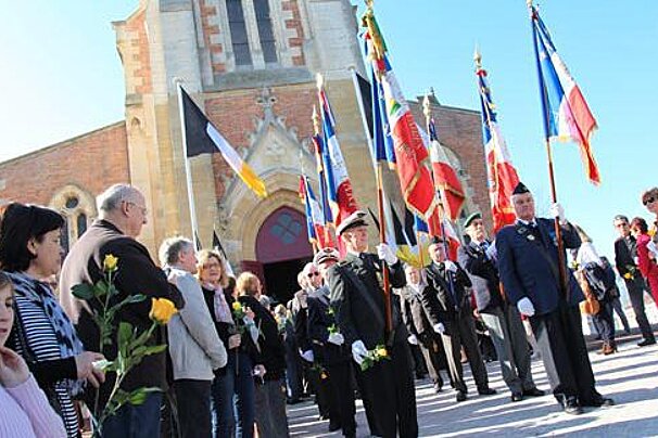 a parade outside of a church after mass