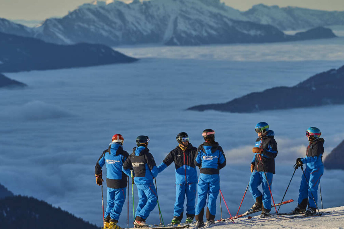 a group of ski and snowboard instructors