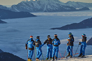 a group of ski and snowboard instructors