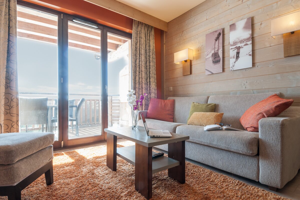 A living room with a couch and a coffee table