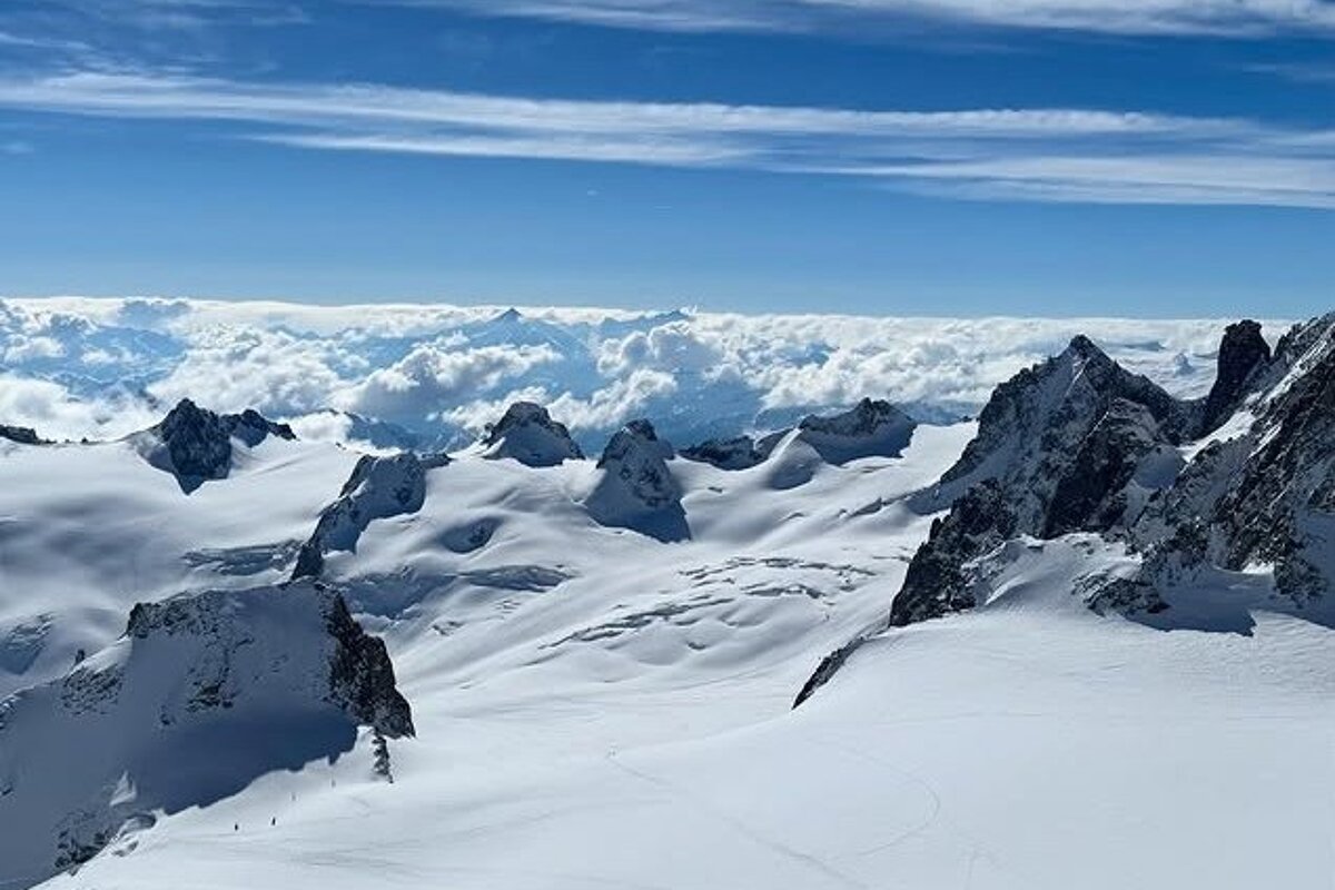 Aiguille du Midi on a sunny day above the clouds