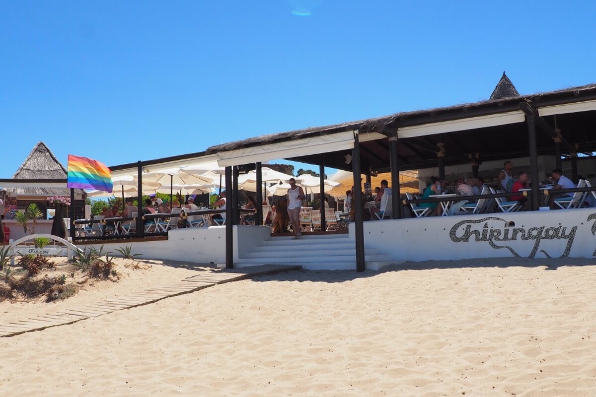 a beach side restaurant in es cavallet in ibiza