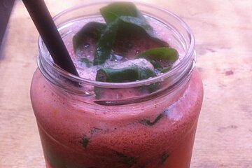 a smoothie served in a jam jar