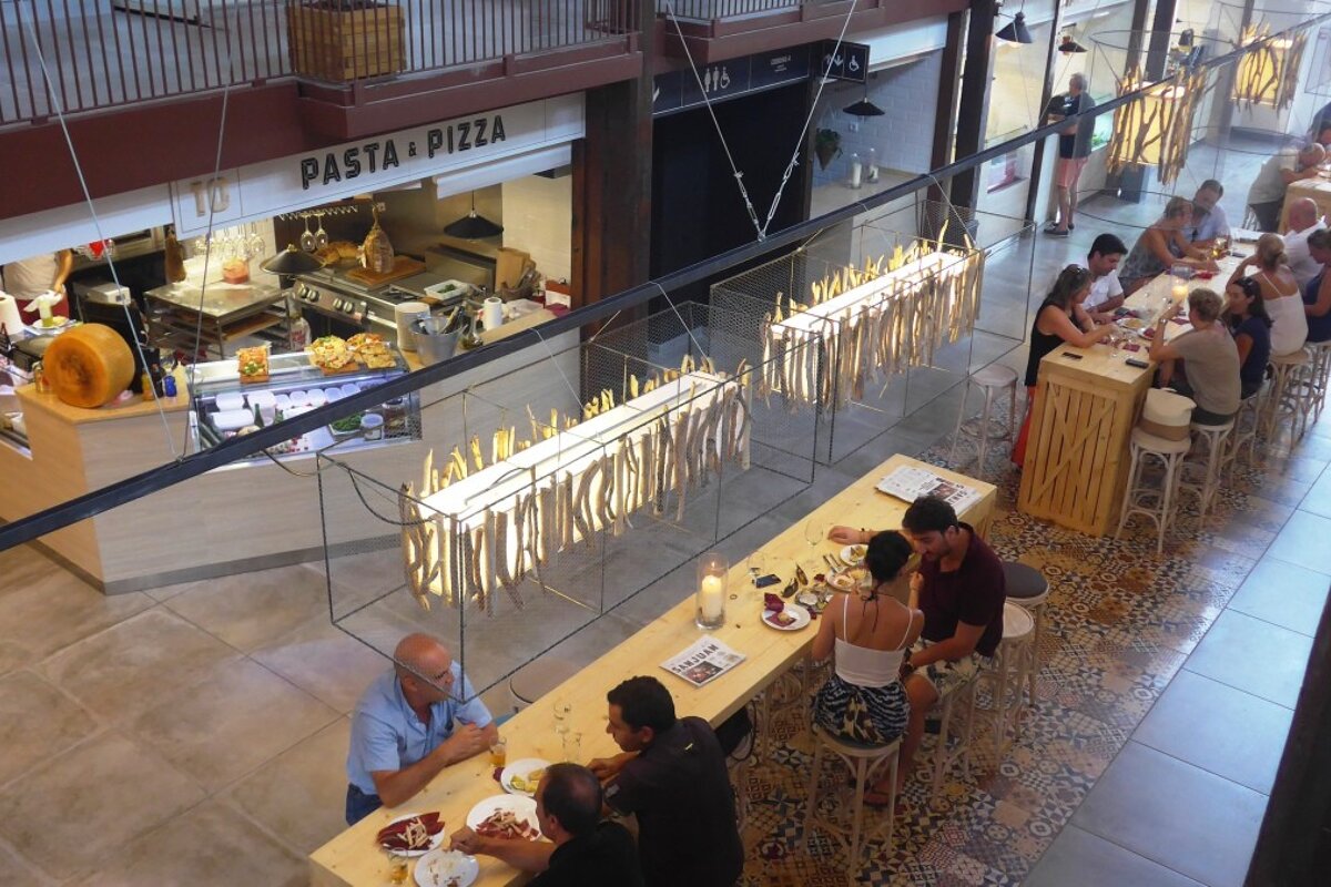 a view down into a market with food stalls