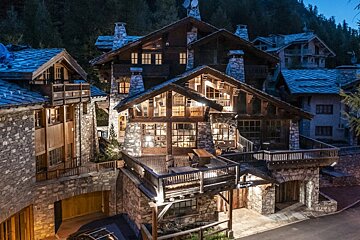 A large house with a sign that says ' residence ' on it