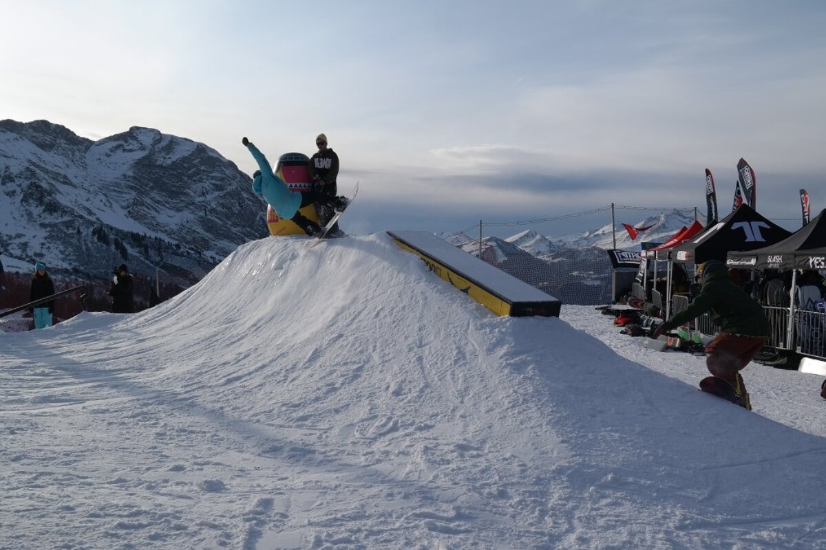 a snowboarding doing a trick in Avoriaz