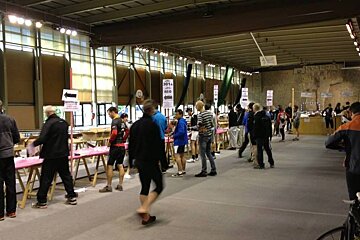 a picture of people registering for a road bike race